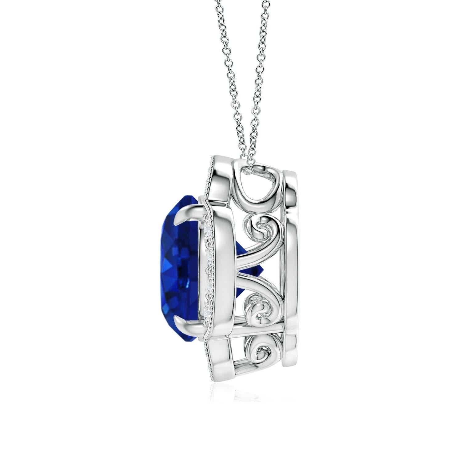 The GIA certified blue sapphire clover pendant appears to be floating on the cable chain. Secured in a claw setting, the blue sapphire is surrounded by a floral halo of dazzling round diamonds. This alluring round sapphire clover pendant is designed
