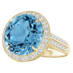 ANGARA Bague en or jaune avec halo de diamants et topaze bleu ciel certifiée par le GIA