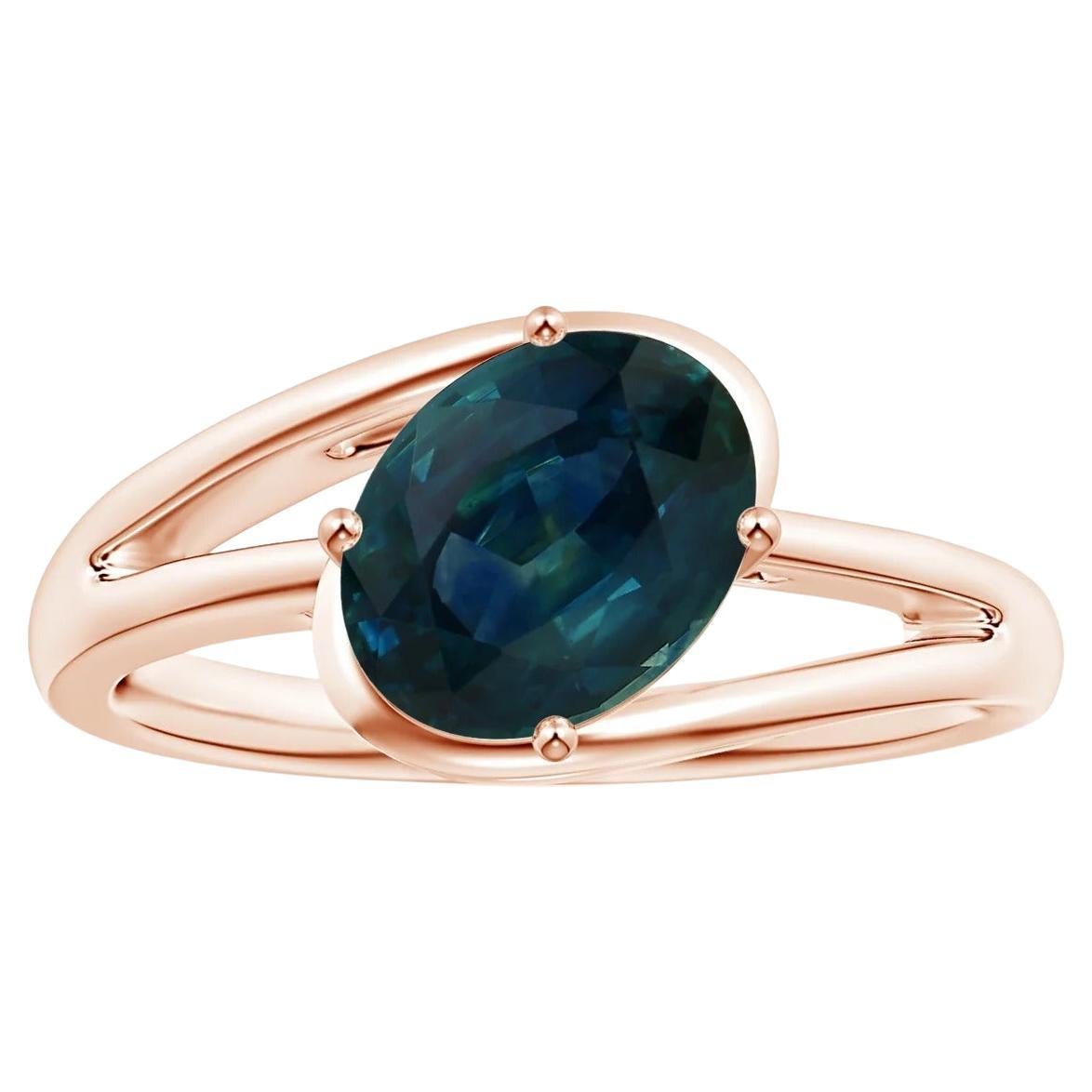 For Sale:  Angara GIA Certified Natural Solitaire Teal Sapphire Bypass Ring in Rose Gold