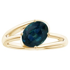 ANGARA GIA Certified Natural Solitaire Teal Sapphire Bypass Ring in Yellow Gold