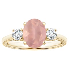 Angara Gia Certified Natural Three Stone Oval Rose Quartz Ring in Yellow Gold