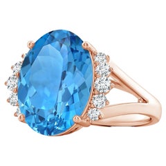 ANGARA GIA Certified Swiss Blue Topaz Ring in Rose Gold with Side Diamonds