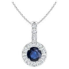 ANGARA Colgante de zafiro azul natural de 0,33 ct con halo de diamantes en oro blanco de 14 quilates