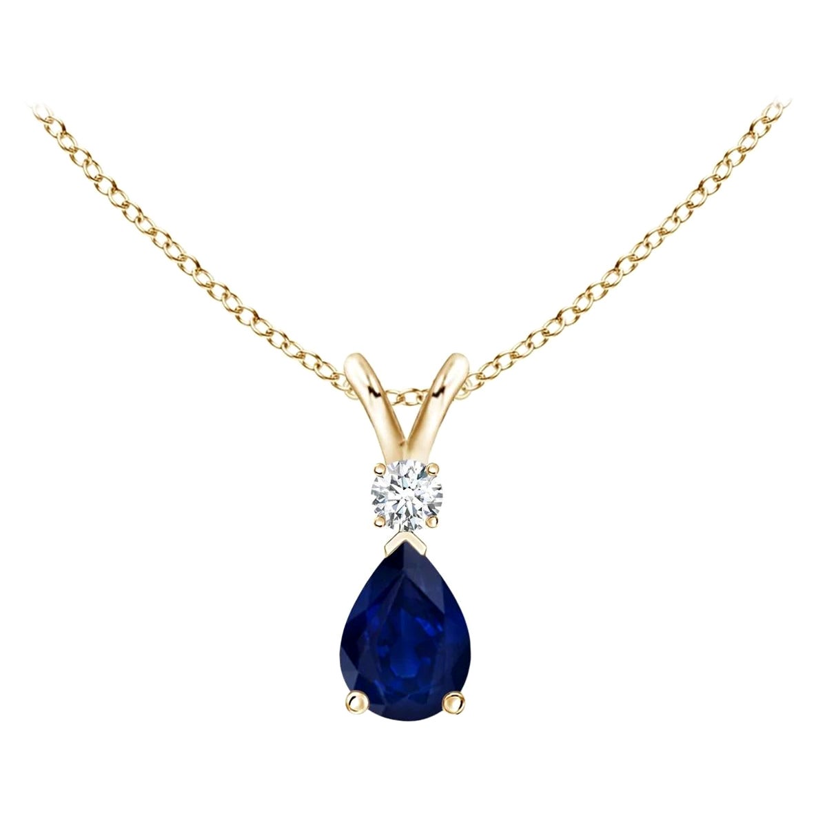 ANGARA Colgante lágrima de zafiro azul natural de 0,40 ct con diamante en oro amarillo en venta