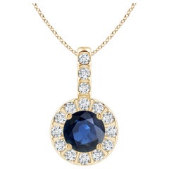 ANGARA Ciondolo con zaffiro blu naturale da 0,60 carati e aureola di diamanti in oro giallo 14K