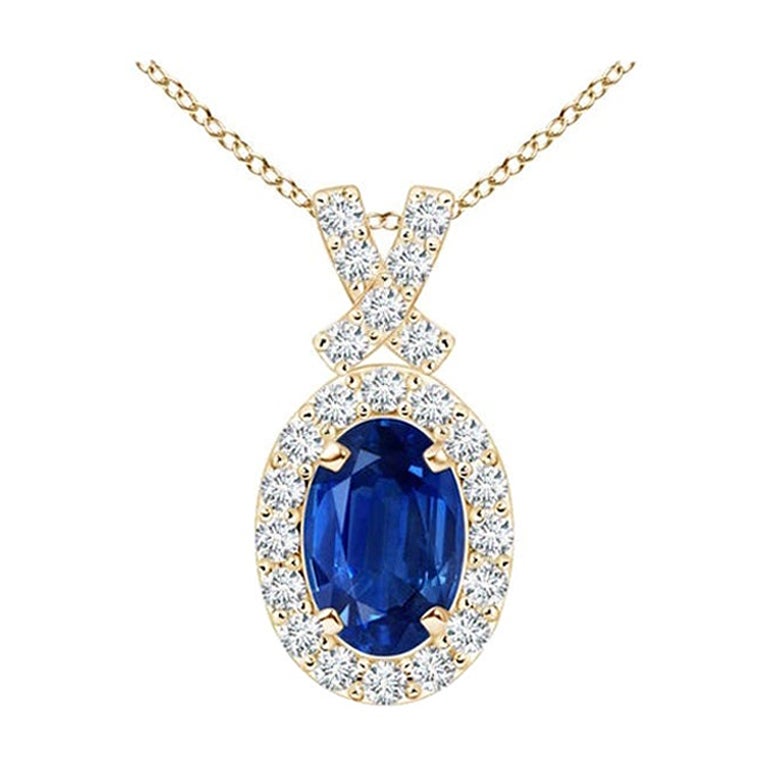 ANGARA Ciondolo con zaffiro blu naturale da 0,60 carati e aureola di diamanti in oro giallo 14K