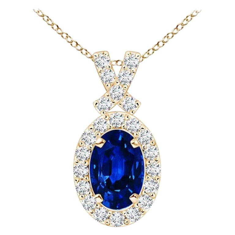 ANGARA Ciondolo con zaffiro blu naturale da 0,60 carati e aureola di diamanti in oro giallo 14K