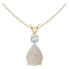 ANGARA Natural 0.70ct Opal Teardrop Pendant with Diamond in 14K Yellow Gold