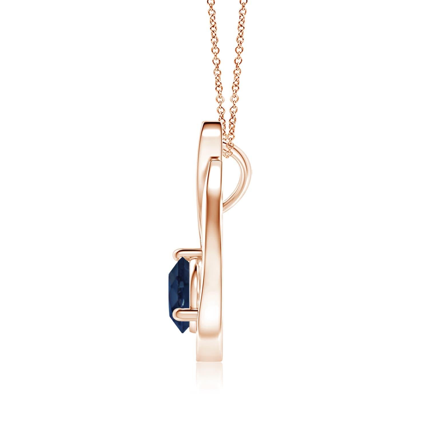 Ein Tulpenanhänger aus 14 Karat Roségold mit einem blauen Saphir, der Sie mit seinem göttlichen Glanz verzaubert. Das Design zeichnet sich durch einen runden Saphir in Zackenfassung und diamantene Akzente aus, die das ozeanartige Funkeln des