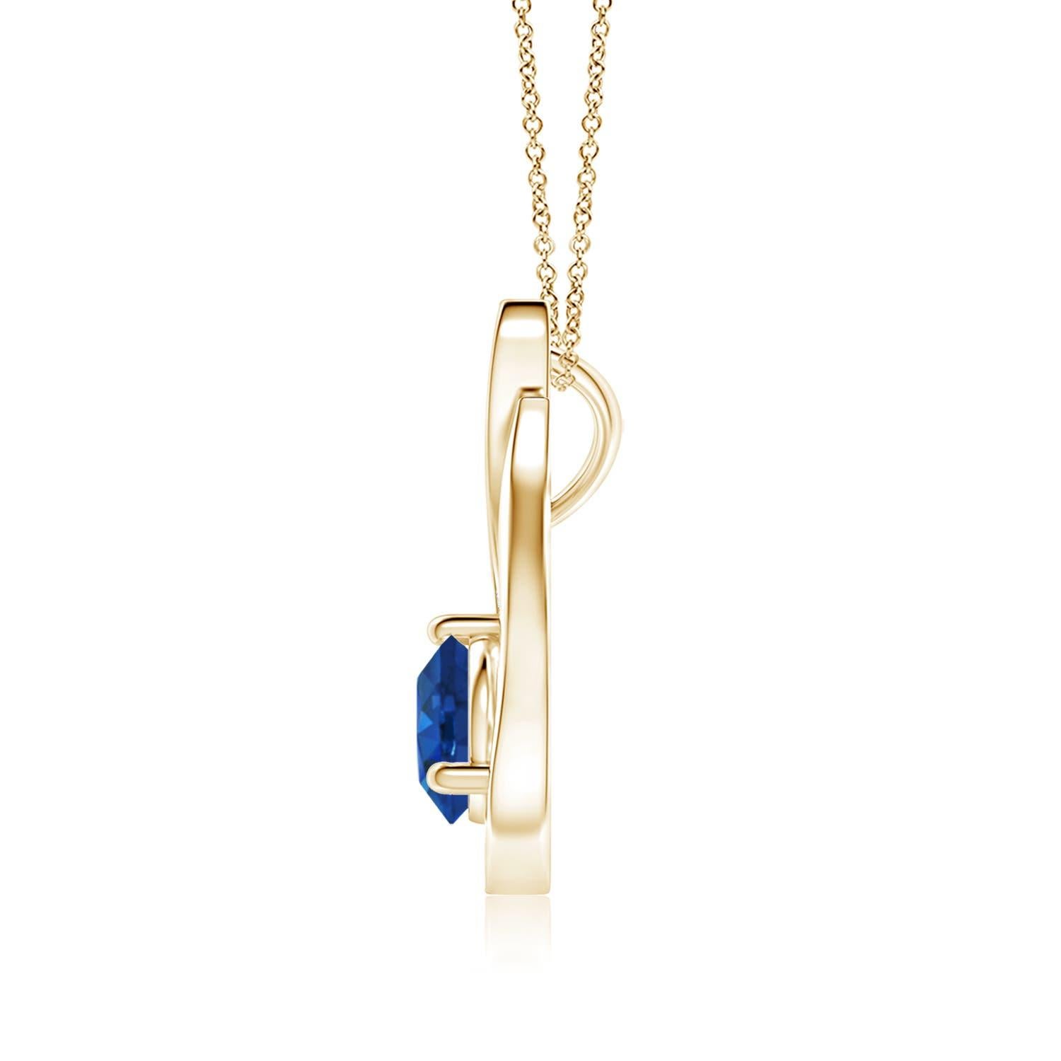 Un colgante tulipán de oro amarillo de 14k con un zafiro azul que te hipnotizará con su divino deslumbramiento. El diseño incluye un zafiro redondo engastado con diamantes que complementan a la perfección el brillo oceánico de la gema. Este colgante