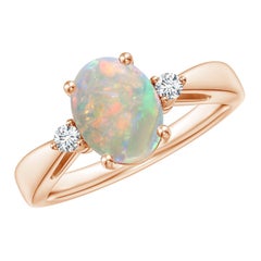Angara Anello solitario con opale naturale da 1,1 ct e diamante in oro massiccio 14 carati