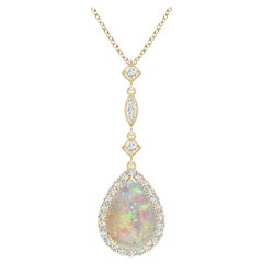 Angara Natural 1.15 ct Opal Teardrop Halo Pendant with Diamond in 14K Solid Gold