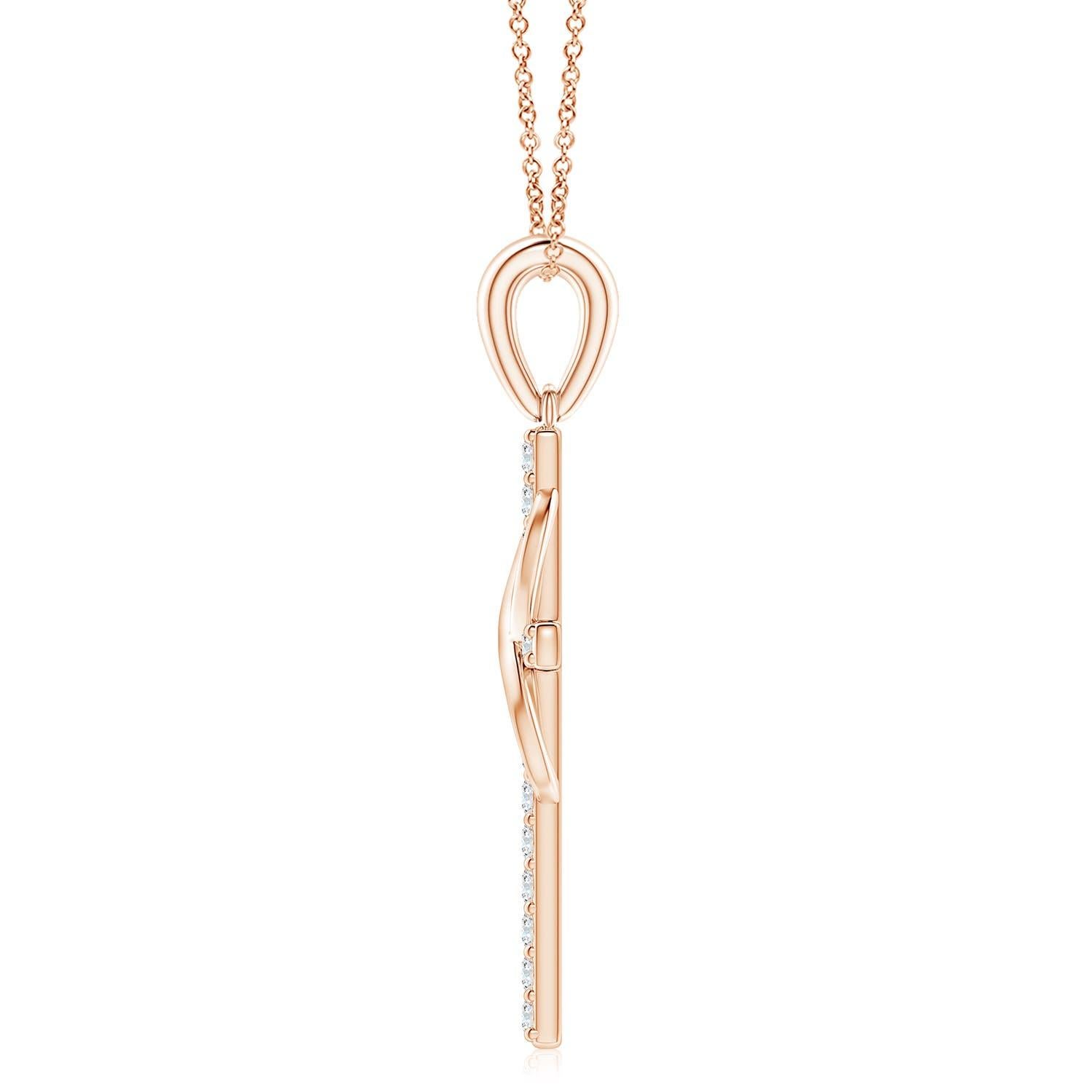 Dieses ikonische religiöse Symbol bietet zwei bedeutungsvolle Blicke in einem. Das mit Diamanten besetzte Kreuz, das an einem schlichten Ballen hängt, steht für Hoffnung und Glauben. Es ist mit einer vertikal verschlungenen Unendlichkeitsschleife