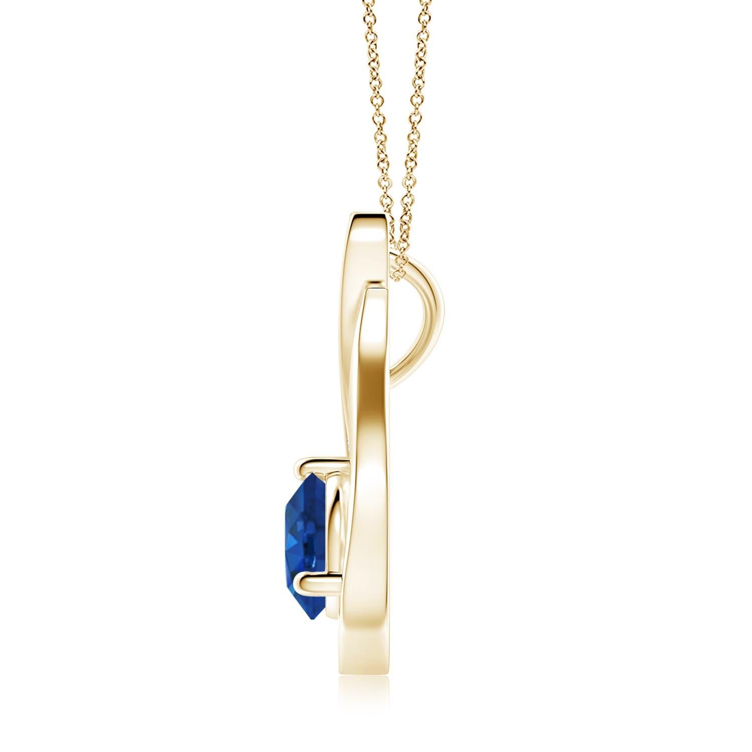 Un ciondolo a tulipano in oro giallo 14k con uno zaffiro blu che ti ipnotizzerà con il suo splendore divino. Il design è caratterizzato da uno zaffiro rotondo incastonato e da accenti di diamante che completano magnificamente lo scintillio della