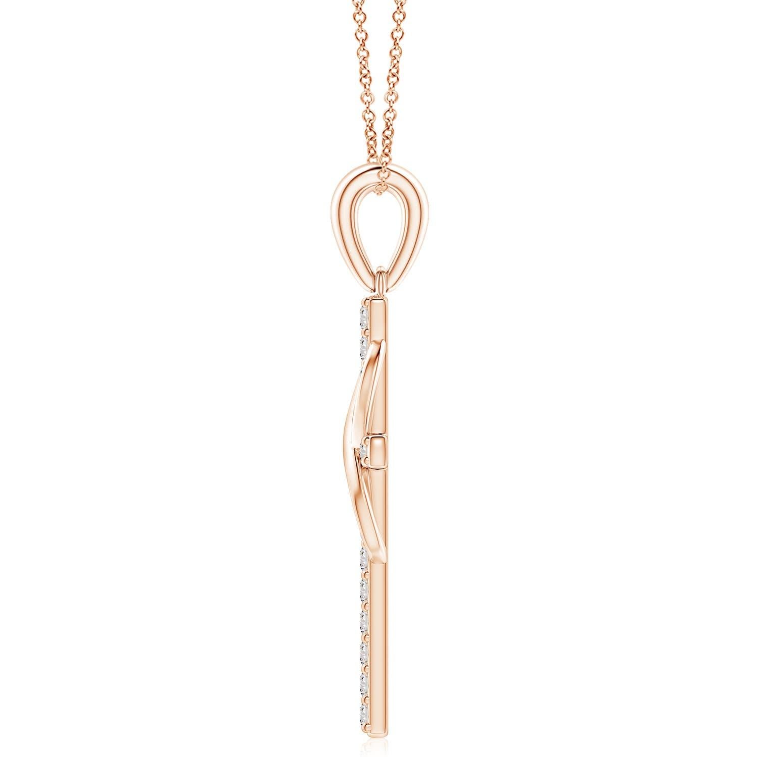 Dieses ikonische religiöse Symbol bietet zwei bedeutungsvolle Blicke in einem. Das mit Diamanten besetzte Kreuz, das an einem schlichten Ballen hängt, steht für Hoffnung und Glauben. Es ist mit einer vertikal verschlungenen Unendlichkeitsschleife