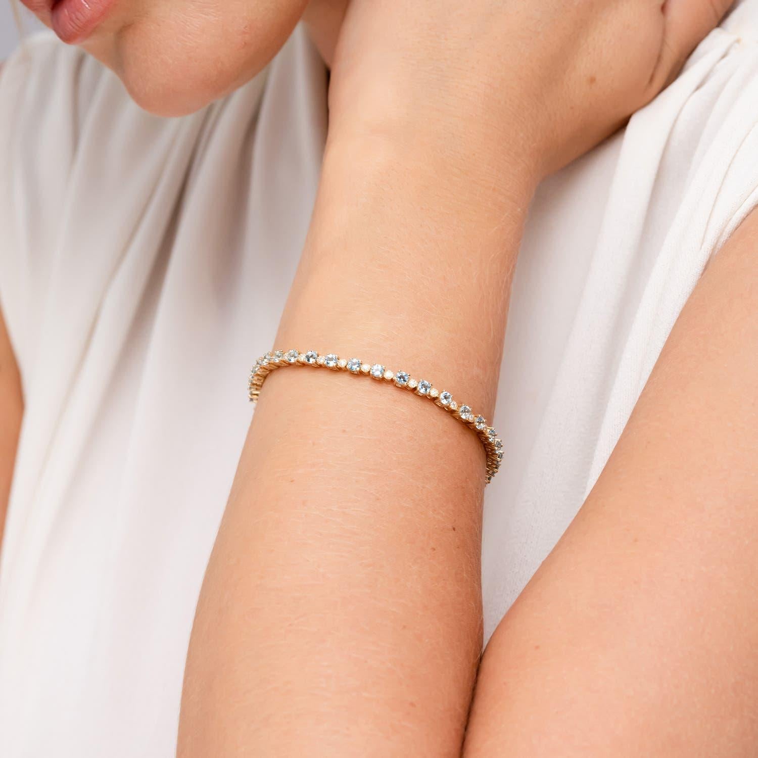 Modern Angara Natural 3.2ct Aquamarine and Illusion Diamond Tennis Bracelet in 14K Gold For Sale