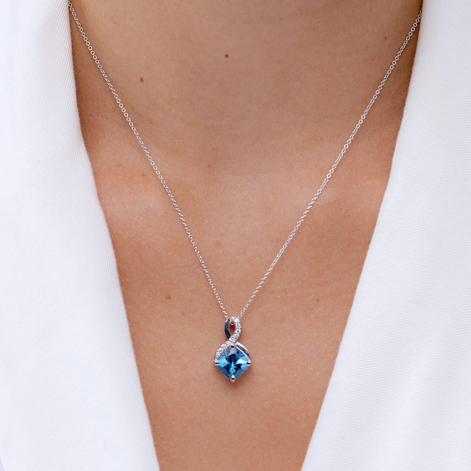 Modern Angara Natural 3.3ct Swiss Blue Topaz Pendant with Diamonds in 14K Solid Gold For Sale