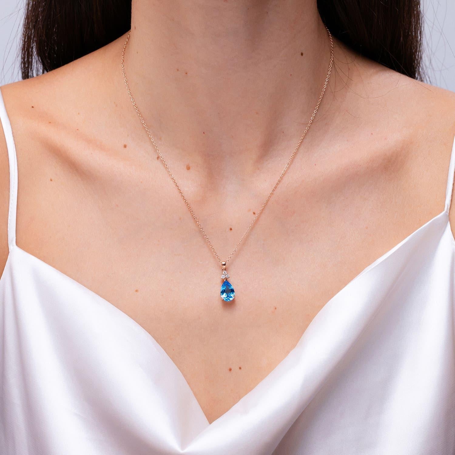 Pear Cut Angara Natural 3.8ct Swiss Blue Topaz Drop Pendant with Diamonds 14K Solid Gold For Sale