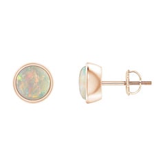 Angara - Boucles d'oreilles en or massif 14 carats - Opale ronde cabochon 1ct, sertie closes par un chaton naturel