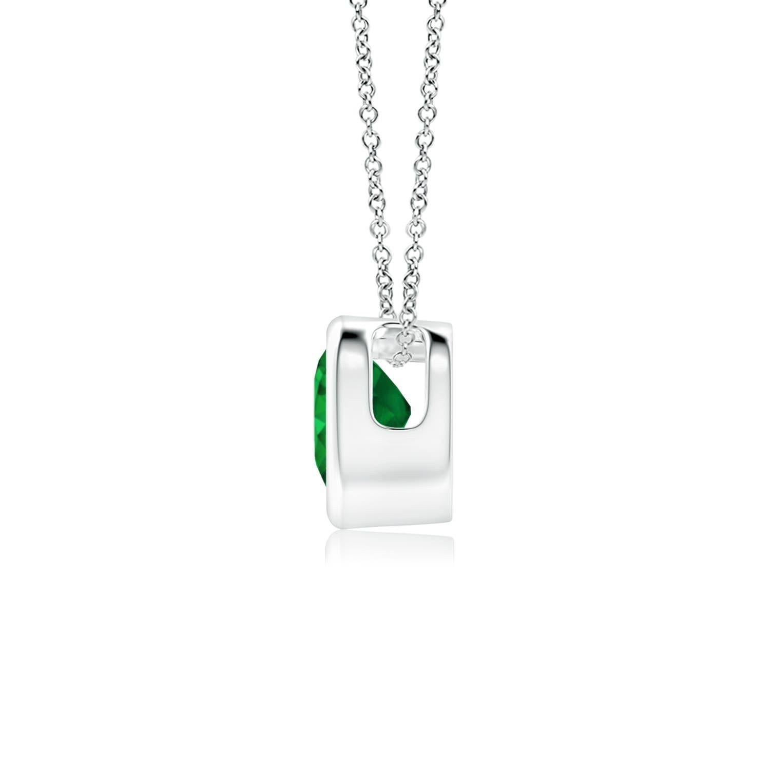 This classic solitaire emerald pendant will steal your heart with its rich green splendor. Crafted in 14k white gold, its design showcases a heart-shaped emerald secured in a bezel setting.
Emerald is the May birthstone and the traditional gemstone