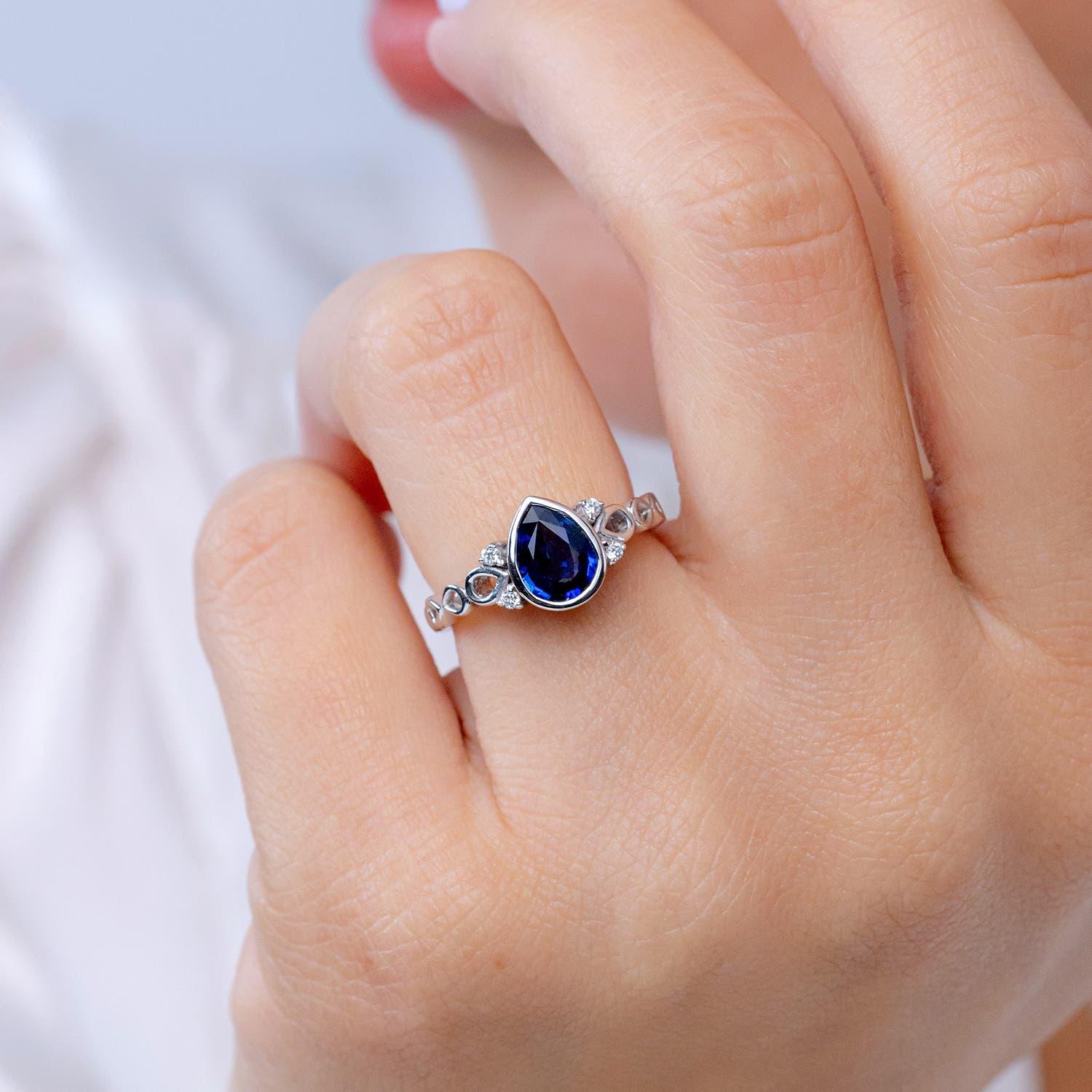 Modern Angara Natural Bezel Set Vintage Pear Sapphire Ring with Diamond in 14K Gold For Sale