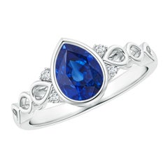 Anello Angara con zaffiro pera vintage naturale incastonato e diamante in oro 14 carati