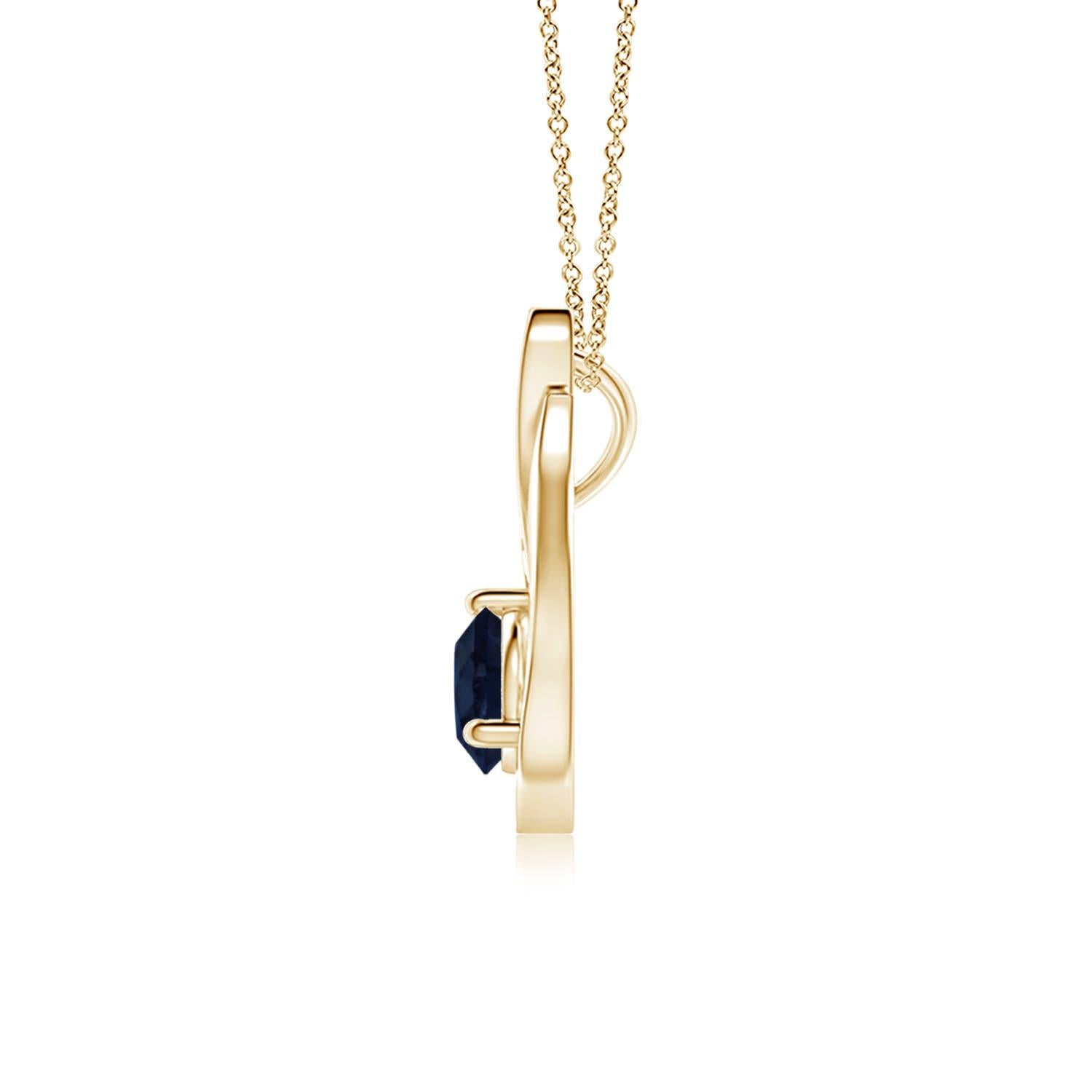 Pendentif tulipe en or jaune 14 carats orné d'un saphir bleu qui vous envoûtera par son éclat divin. Le modèle présente un saphir rond serti sur un anneau et des accents de diamant qui complètent magnifiquement l'éclat de la pierre précieuse,
