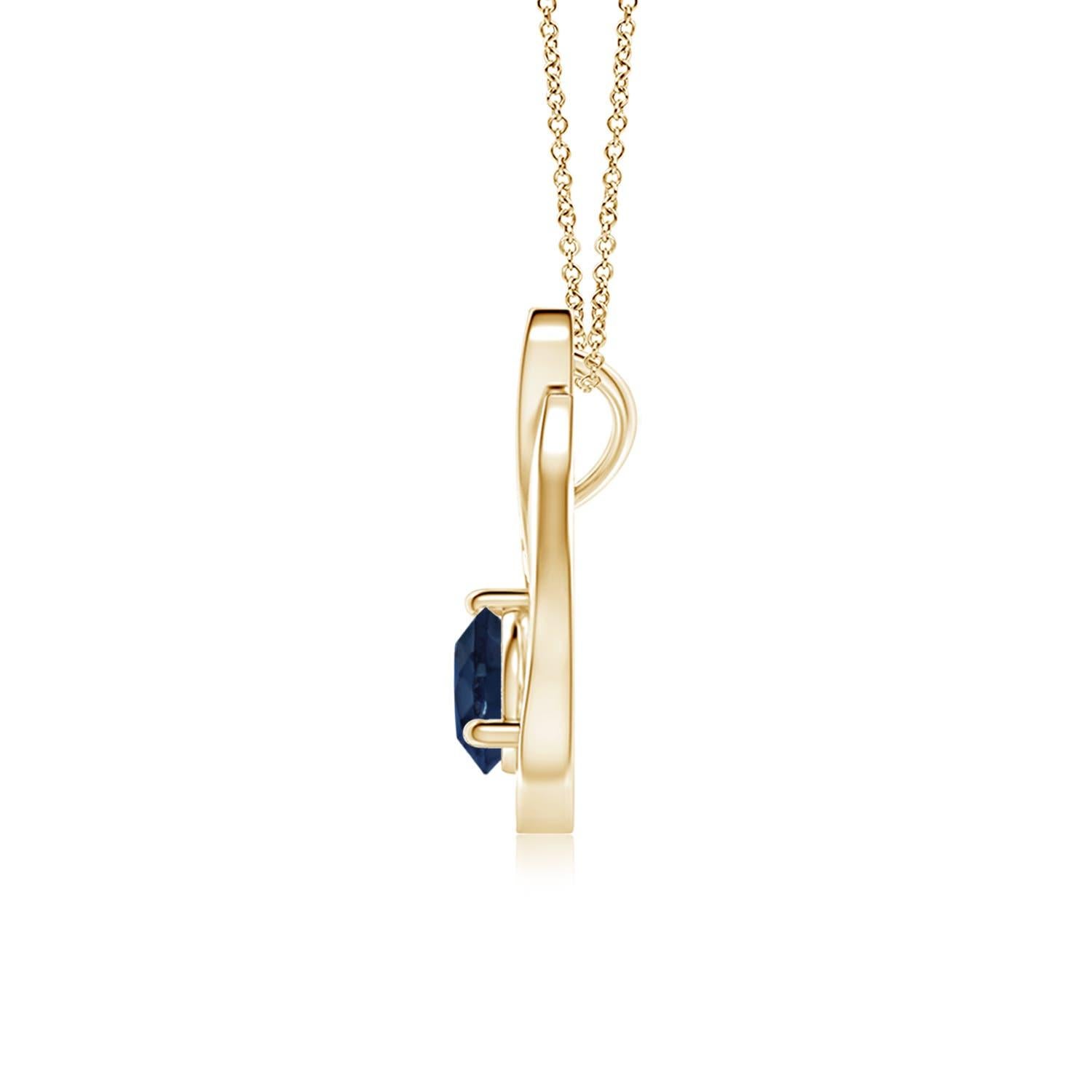 Pendentif tulipe en or jaune 14 carats orné d'un saphir bleu qui vous envoûtera par son éclat divin. Le modèle présente un saphir rond serti sur un anneau et des accents de diamant qui complètent magnifiquement l'éclat de la pierre précieuse,