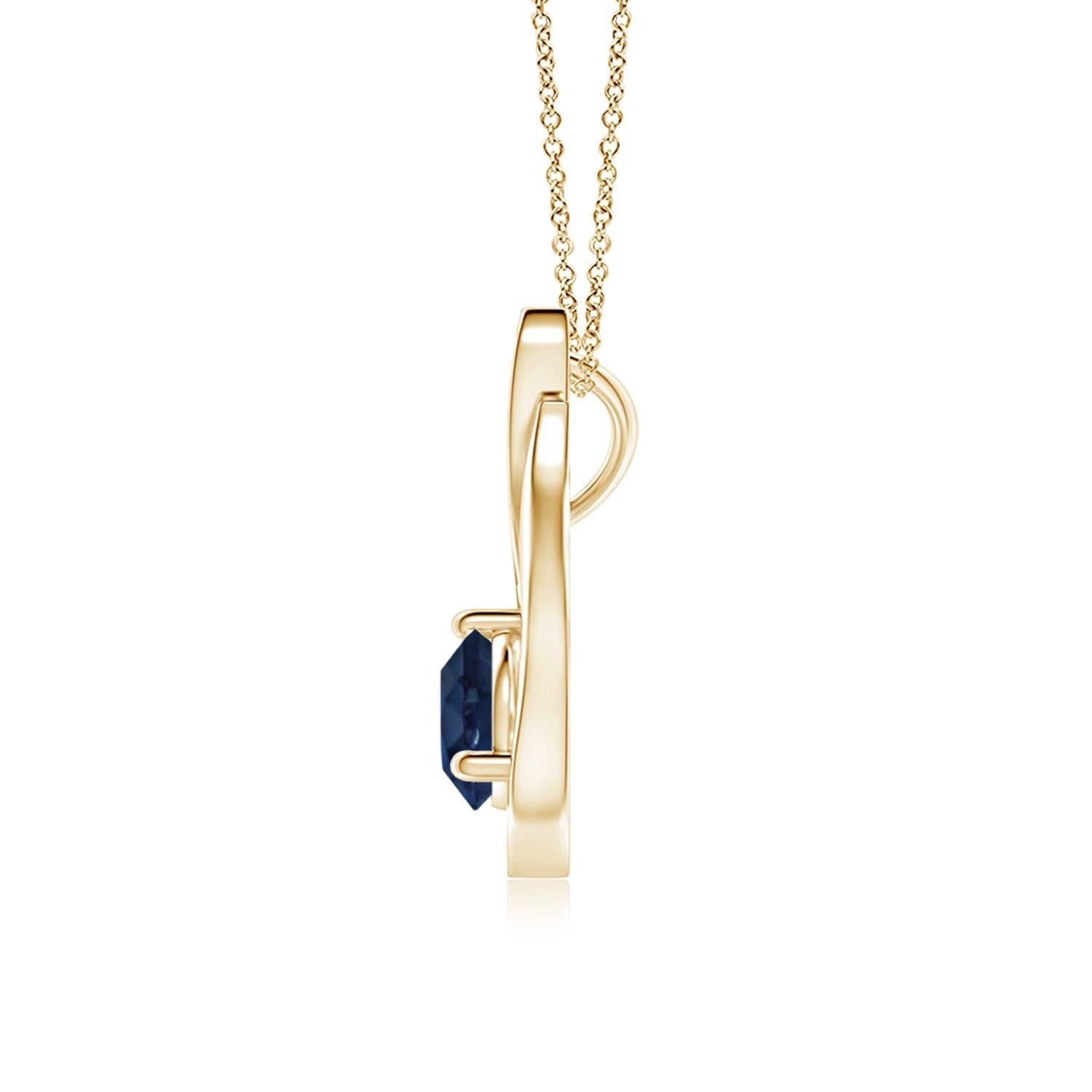 Pendentif tulipe en or jaune 14 carats orné d'un saphir bleu qui vous envoûtera par son éclat divin. Le modèle présente un saphir rond serti sur un anneau et des accents de diamant qui complètent magnifiquement l'éclat de la pierre précieuse,