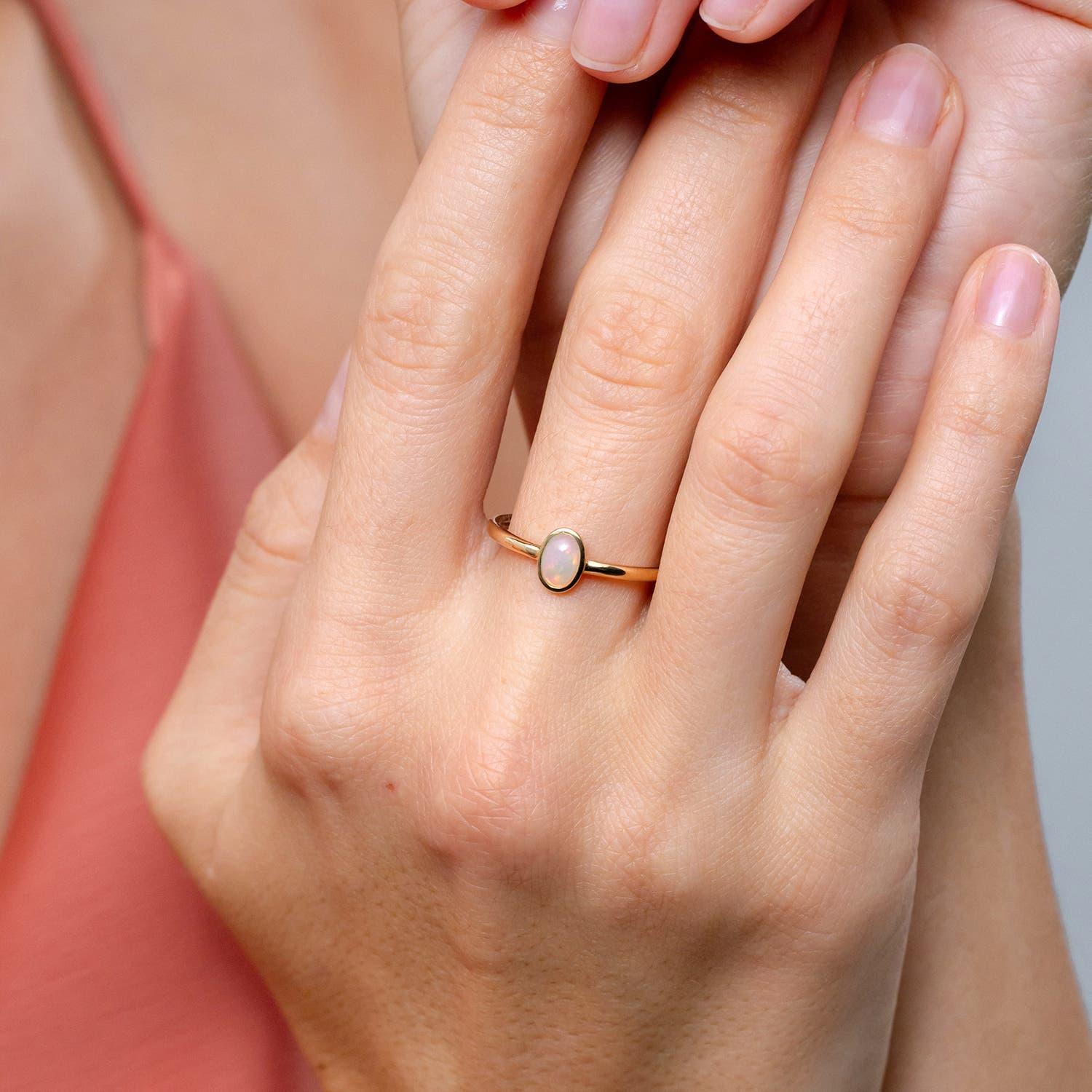 Modern Angara Natural Classic Bezel-Set Oval Opal Ring in 14K Solid Gold for Women For Sale