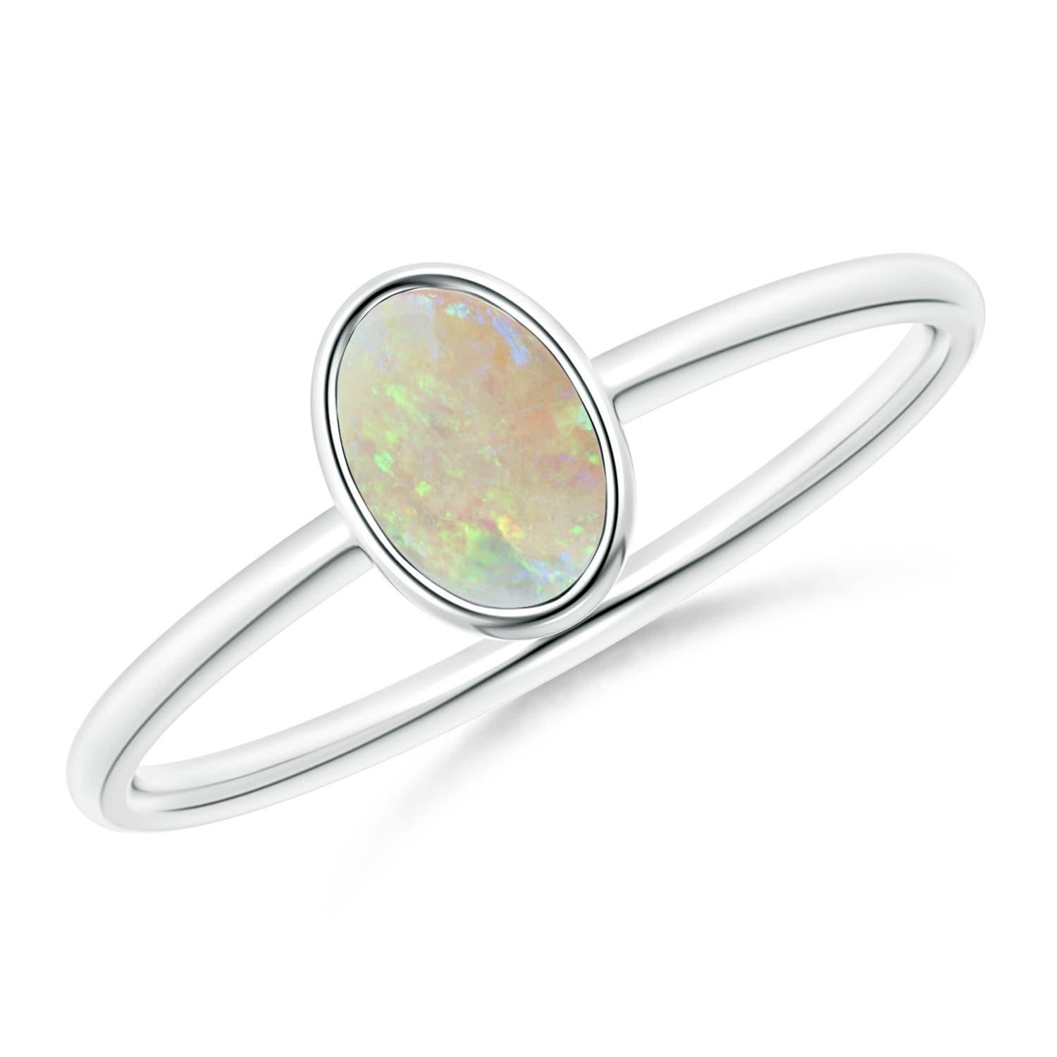Women's Angara Natural Classic Bezel-Set Oval Opal Ring in 14K Solid Gold for Women For Sale