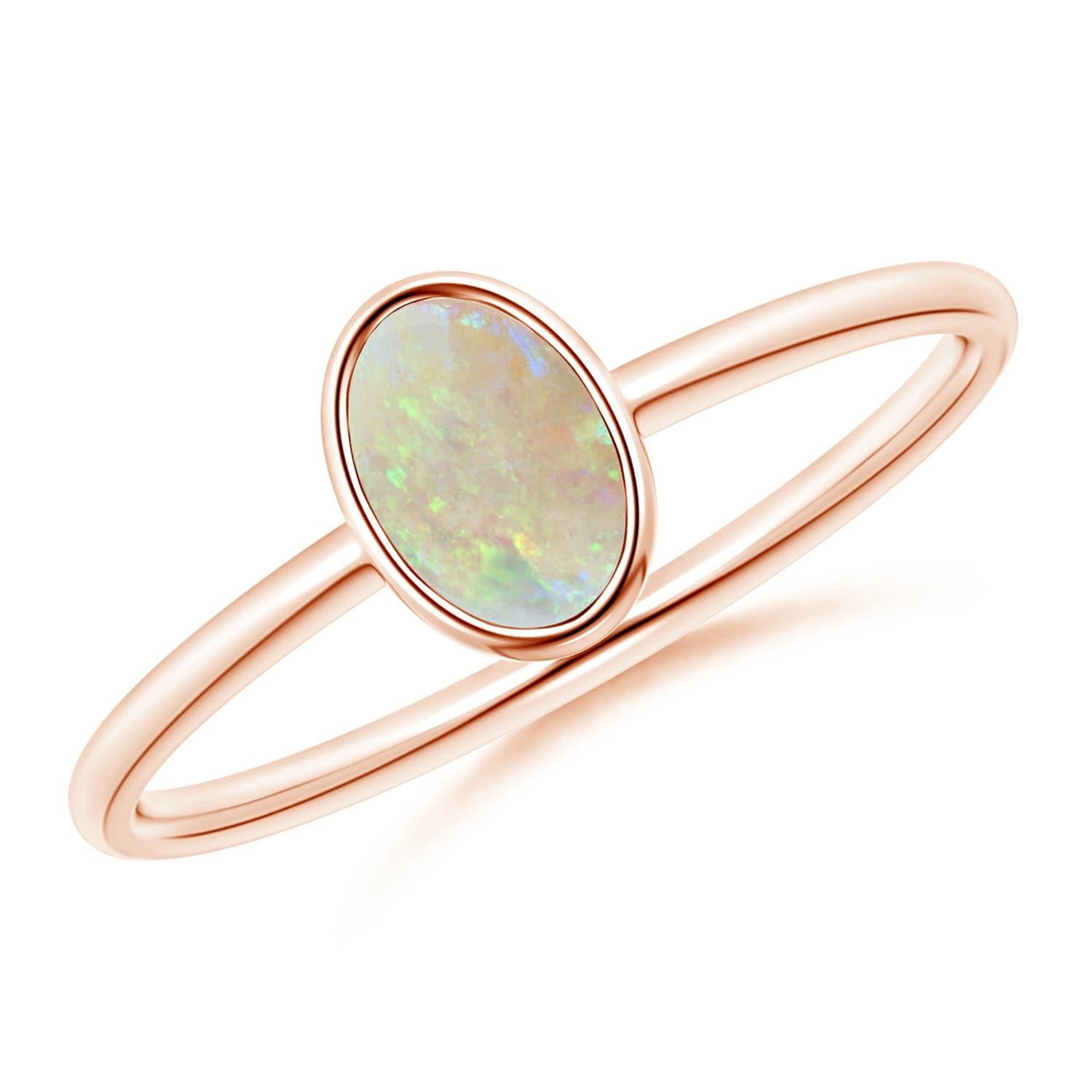 Angara Natural Classic Bezel-Set Oval Opal Ring in 14K Solid Gold for Women For Sale 1