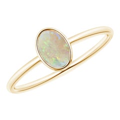 Angara Natural Classic Bezel-Set Oval Opal Ring in 14K Solid Gold for Women