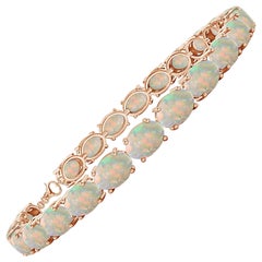 Angara Natural Classic Oval 10,8 kt Opal Tennis Link Armband in 14K massivem Gold