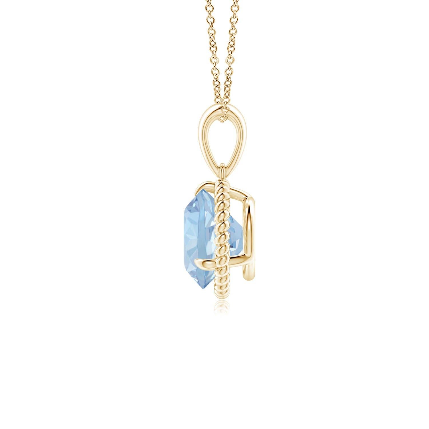 Eleganza e semplicità, questo ciondolo con solitario di acquamarina è realizzato in oro giallo 14k. L'acquamarina rotonda con artiglio incastonato è circondata da una cornice di corda attorcigliata che conferisce un tocco di unicità al
