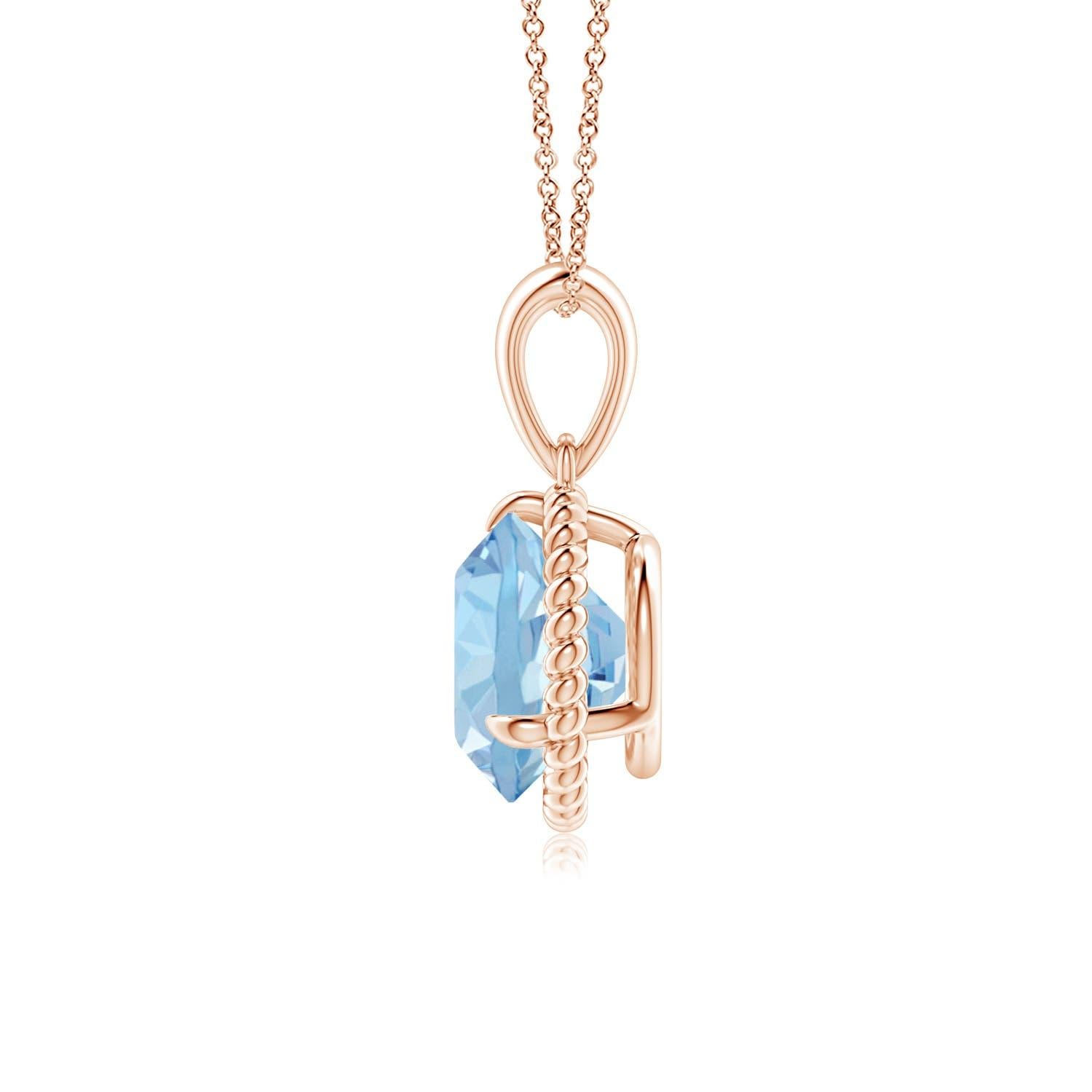 Exuding simplicity with a dash of elegance, this aquamarine solitaire dangle pendant is designed in 14k rose gold. The round claw prong set aquamarine is surrounded by a twisted rope frame that lends a touch of uniqueness to the design.
Aquamarine