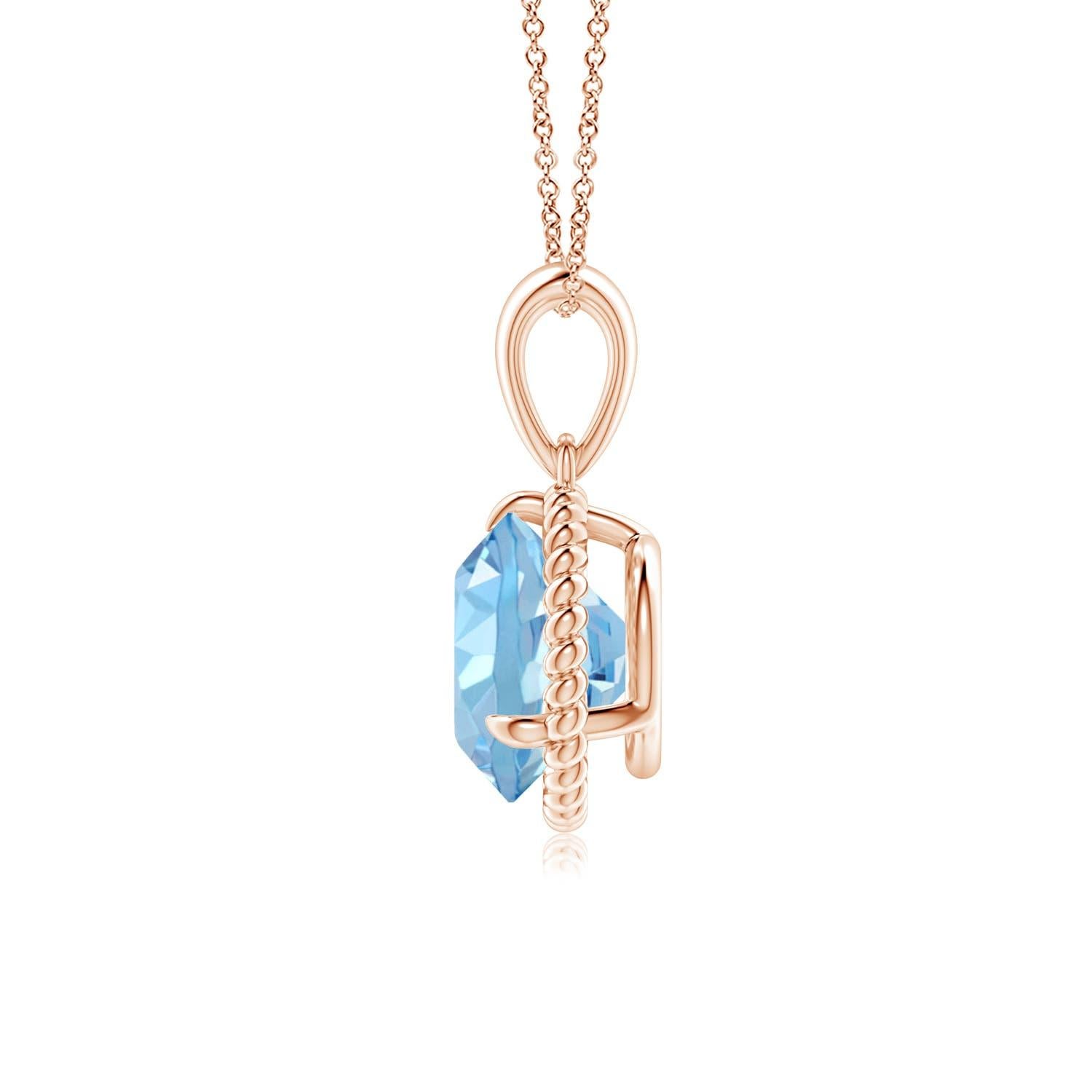 Dieser Aquamarin-Solitär-Anhänger aus 14-karätigem Roségold strahlt Schlichtheit mit einem Hauch von Eleganz aus. Der runde, mit Zacken besetzte Aquamarin ist von einem gedrehten Seilrahmen umgeben, der dem Design einen Hauch von Einzigartigkeit