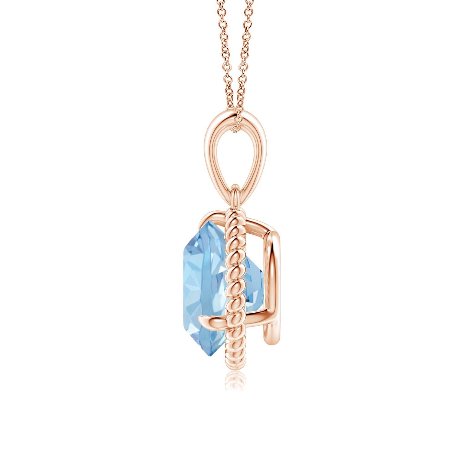 Eleganza e semplicit�à, questo ciondolo con solitario di acquamarina è realizzato in oro rosa 14k. L'acquamarina rotonda con artiglio incastonato è circondata da una cornice di corda attorcigliata che conferisce un tocco di unicità al