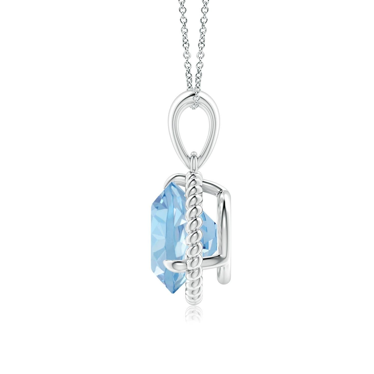 Eleganza e semplicità, questo ciondolo con solitario di acquamarina è realizzato in oro bianco 14k. L'acquamarina rotonda con artiglio incastonato è circondata da una cornice di corda attorcigliata che conferisce un tocco di unicità al
