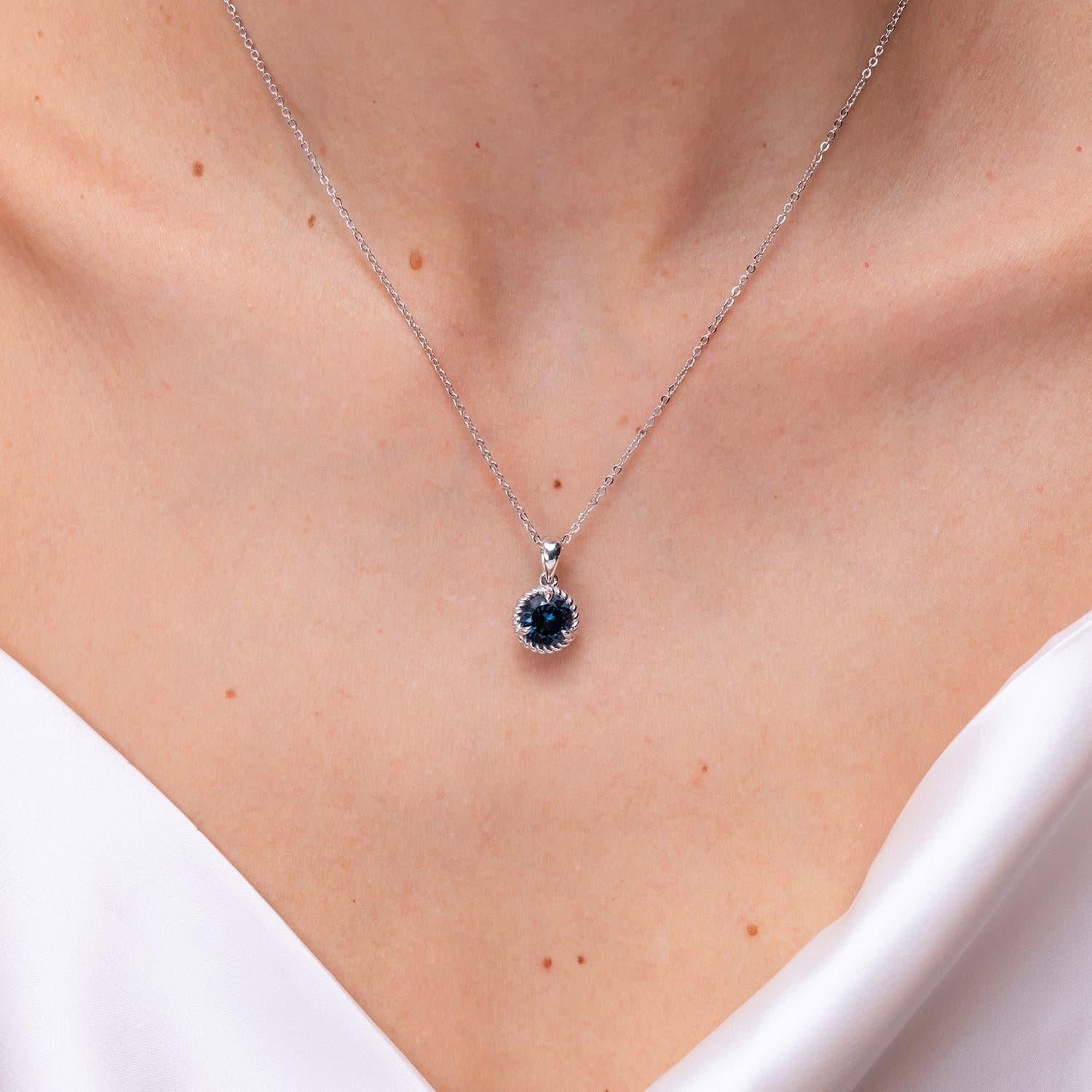 Modern Angara Natural Claw-Set 2.35 ct London Blue Topaz Solitaire Pendant in 14K Gold For Sale