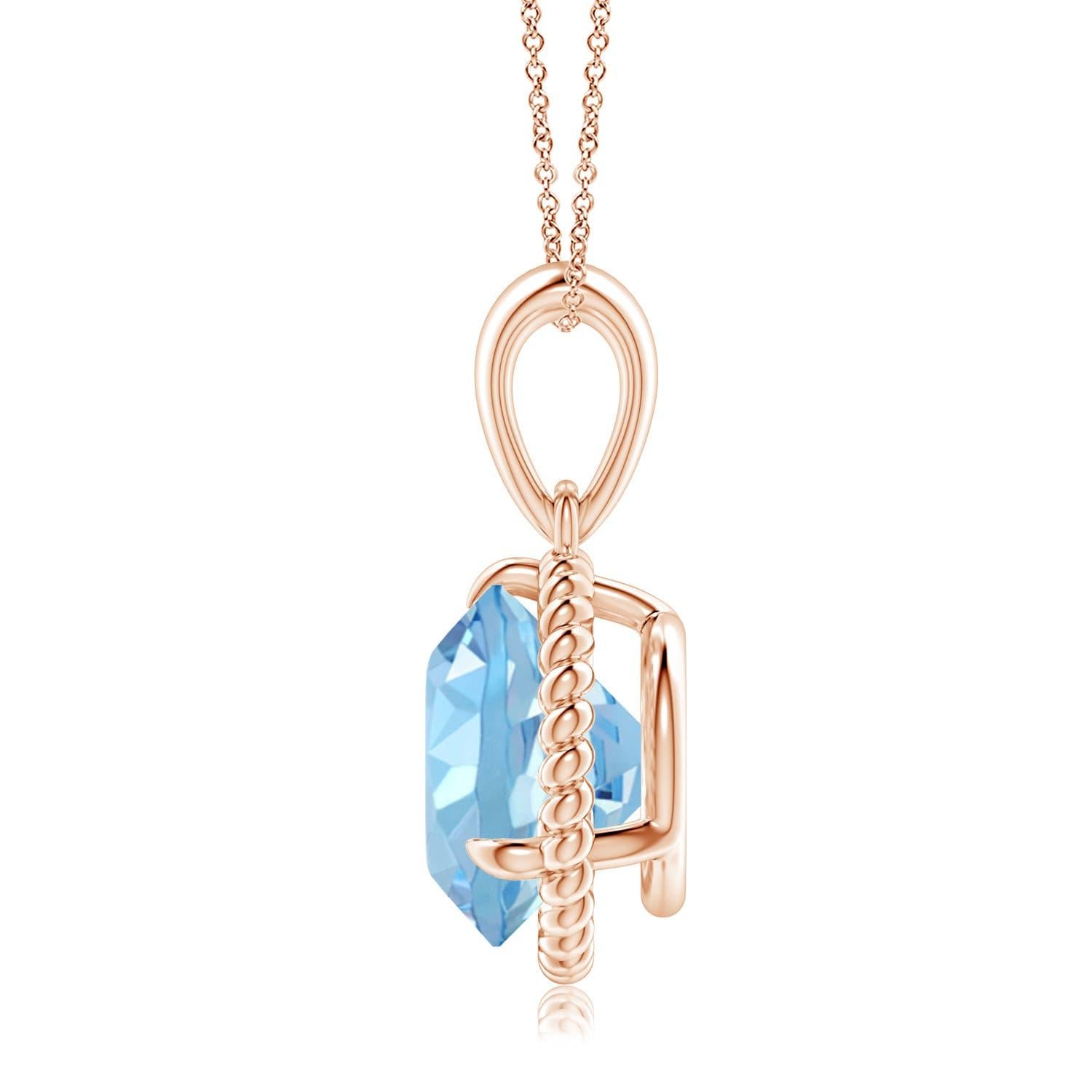 Eleganza e semplicità, questo ciondolo con solitario di acquamarina è realizzato in oro rosa 14k. L'acquamarina rotonda con artiglio incastonato è circondata da una cornice di corda attorcigliata che conferisce un tocco di unicità al