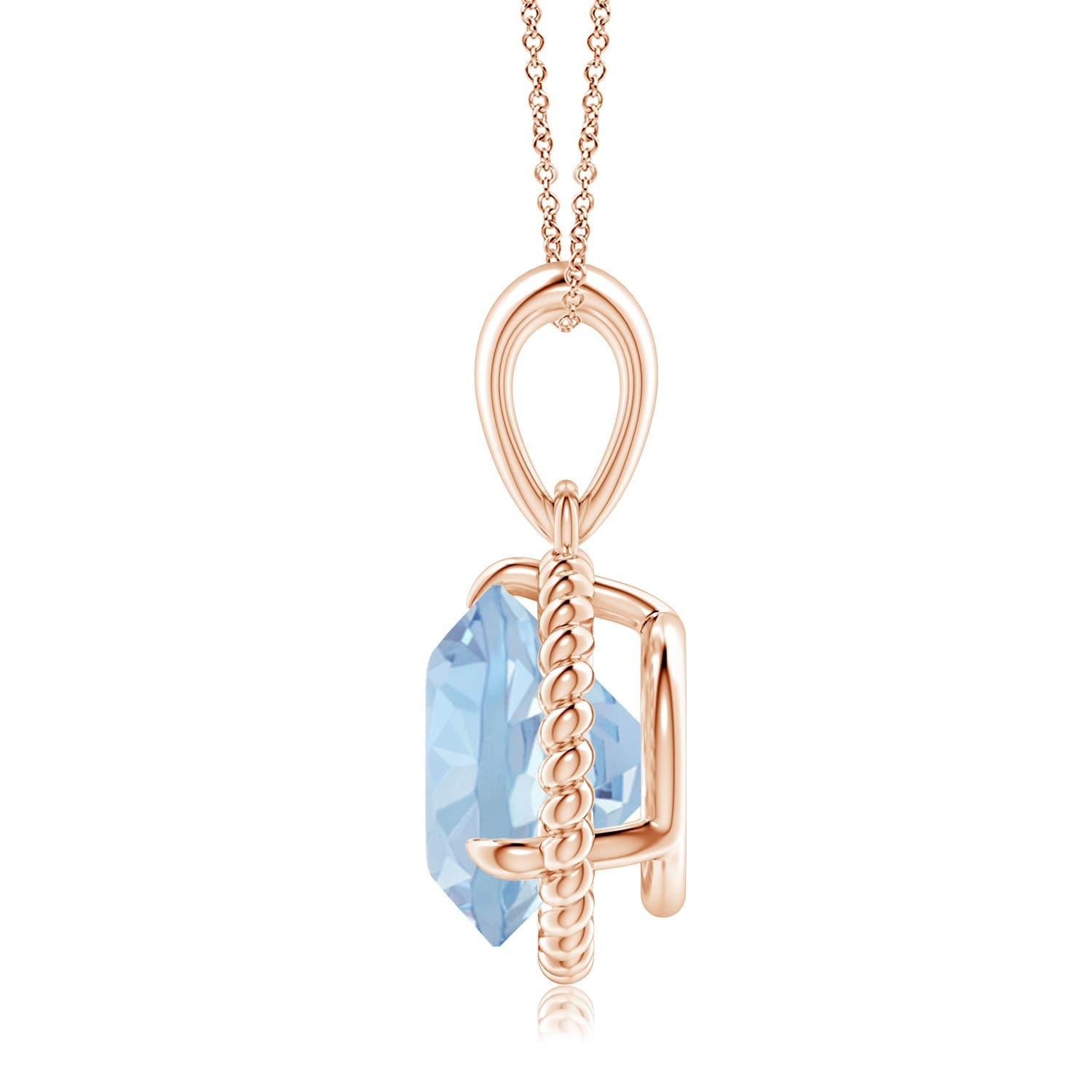 Eleganza e semplicit�à, questo ciondolo con solitario di acquamarina è realizzato in oro rosa 14k. L'acquamarina rotonda con artiglio incastonato è circondata da una cornice di corda attorcigliata che conferisce un tocco di unicità al
