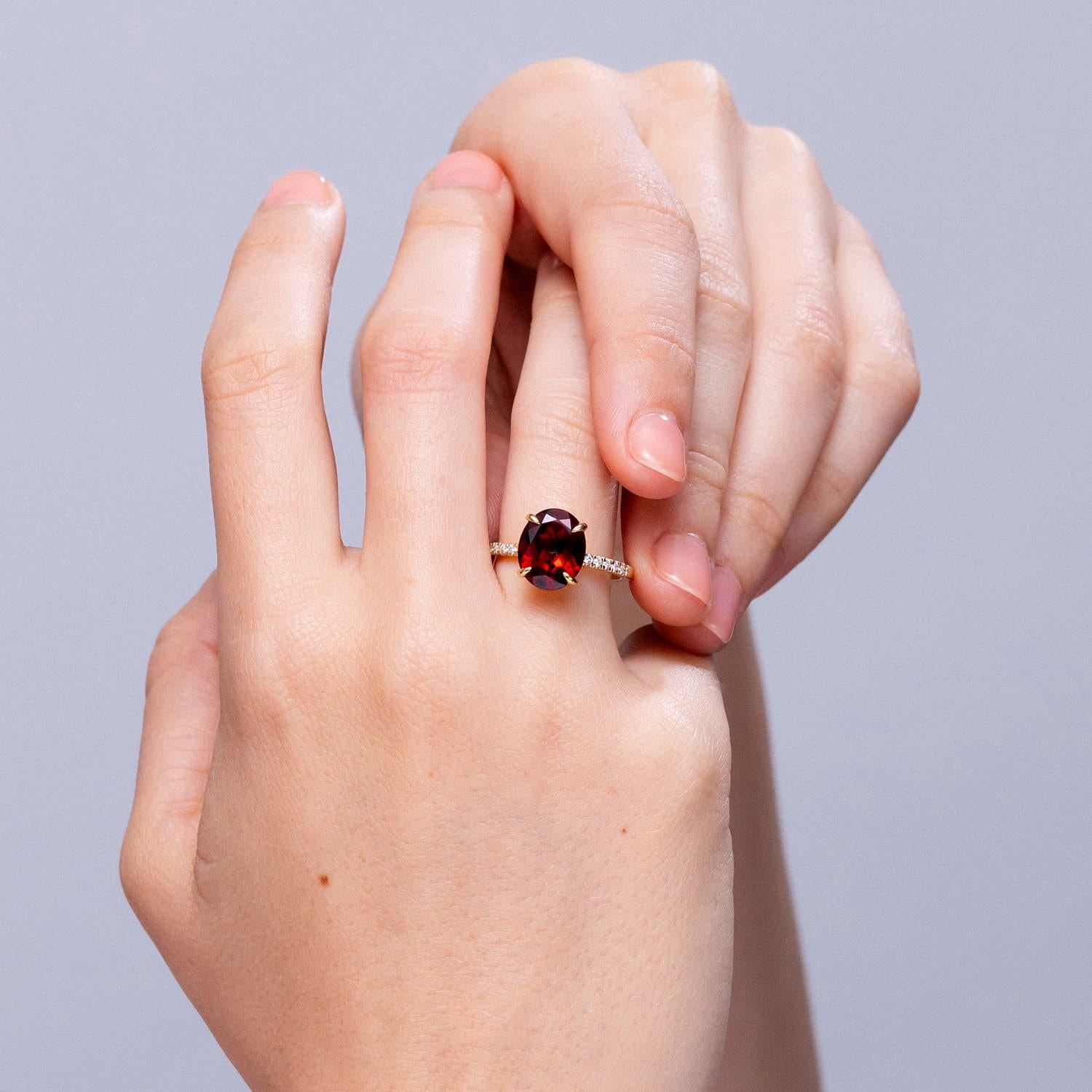 Modern Angara Natural Claw-Set Oval 4.2 ct Garnet Ring with Diamonds in 14K Solid Gold For Sale