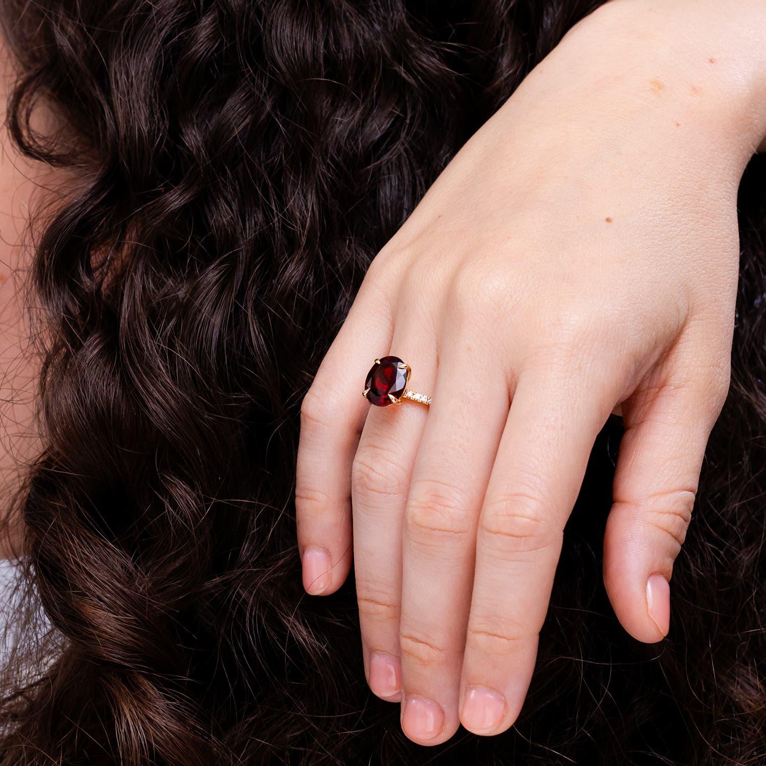 Angara Natural Claw-Set Oval 4.2 ct Garnet Ring with Diamonds in 14K Solid Gold In New Condition For Sale In Los Angeles, CA