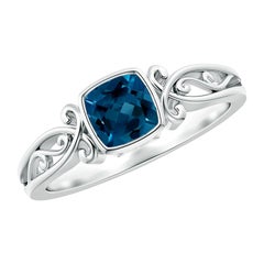 Anello Solitario Angara con Topazio Blu London a cuscino naturale in oro massiccio 14K
