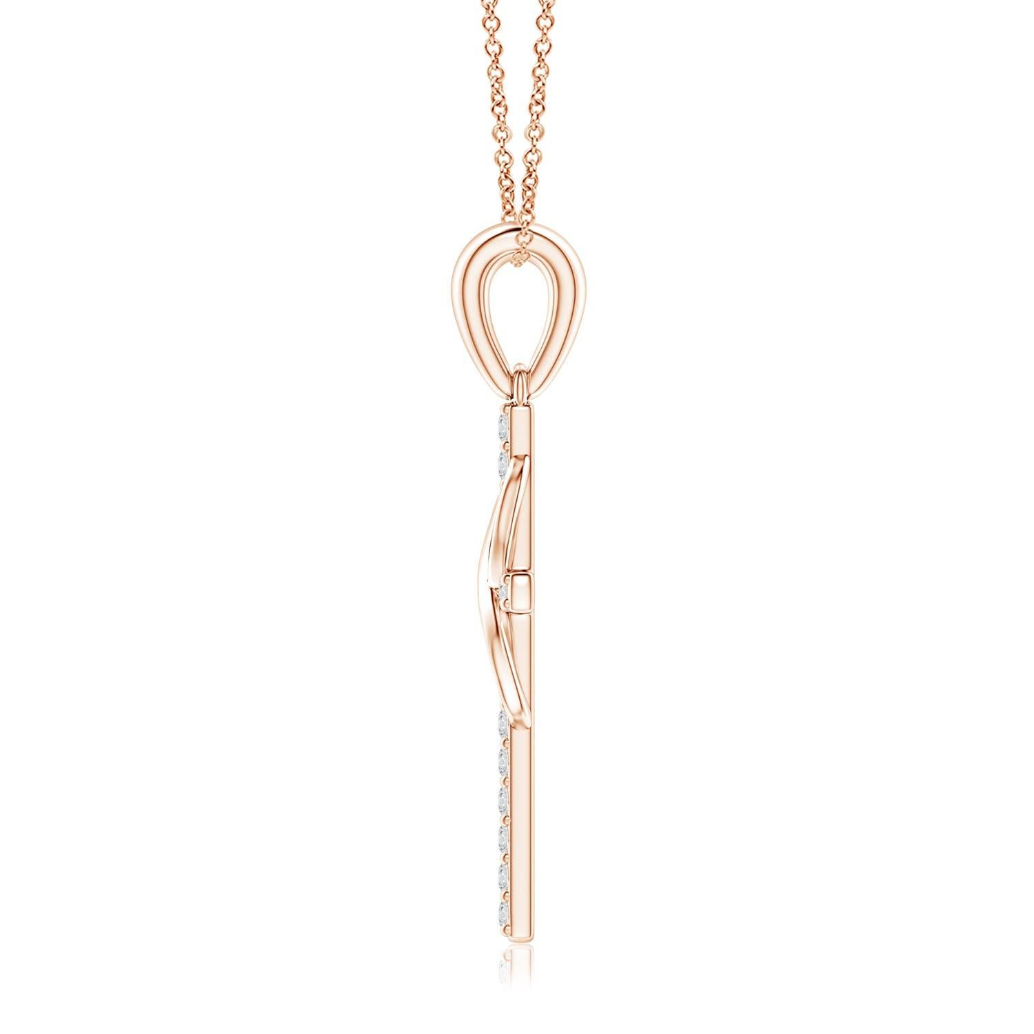 Dieses ikonische religiöse Symbol bietet zwei bedeutungsvolle Blicke in einem. Das mit Diamanten besetzte Kreuz, das an einem schlichten Ballen hängt, steht für Hoffnung und Glauben. Er ist mit einer vertikal verschlungenen Unendlichkeitsschleife