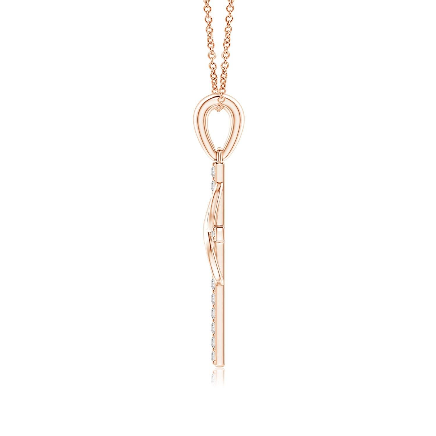 Dieses ikonische religiöse Symbol bietet zwei bedeutungsvolle Blicke in einem. Das mit Diamanten besetzte Kreuz, das an einem schlichten Ballen hängt, steht für Hoffnung und Glauben. Es ist mit einer vertikal verschlungenen Unendlichkeitsschleife