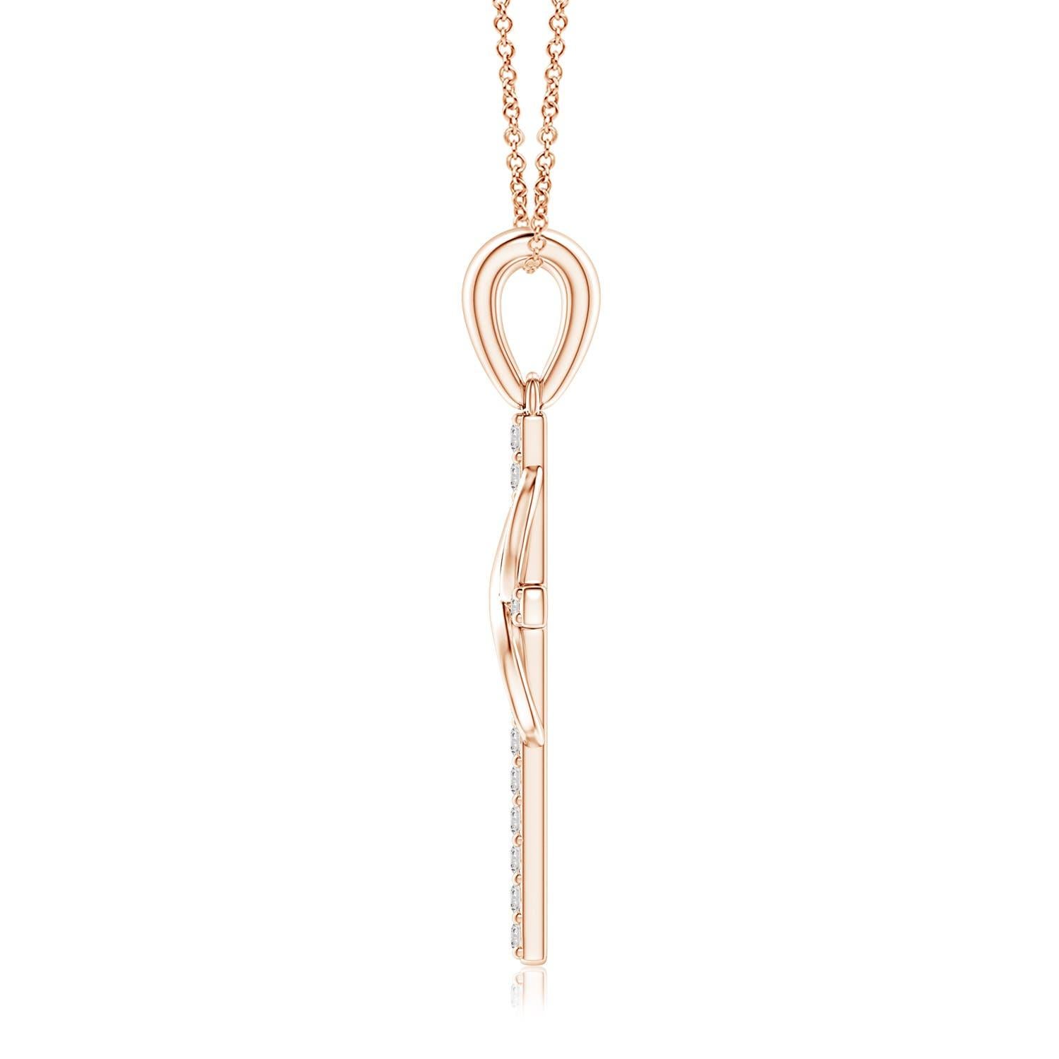 Dieses ikonische religiöse Symbol bietet zwei bedeutungsvolle Blicke in einem. Das mit Diamanten besetzte Kreuz, das an einem schlichten Ballen hängt, steht für Hoffnung und Glauben. Er ist mit einer vertikal verschlungenen Unendlichkeitsschleife