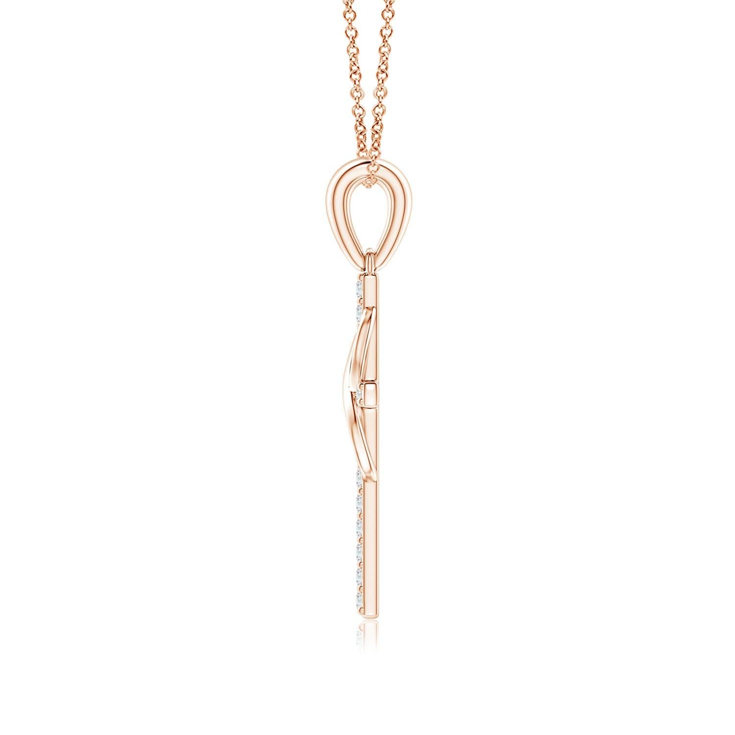 Dieses ikonische religiöse Symbol bietet zwei bedeutungsvolle Blicke in einem. Das mit Diamanten besetzte Kreuz, das an einem schlichten Ballen hängt, steht für Hoffnung und Glauben. Es ist mit einer vertikal verschlungenen Unendlichkeitsschleife