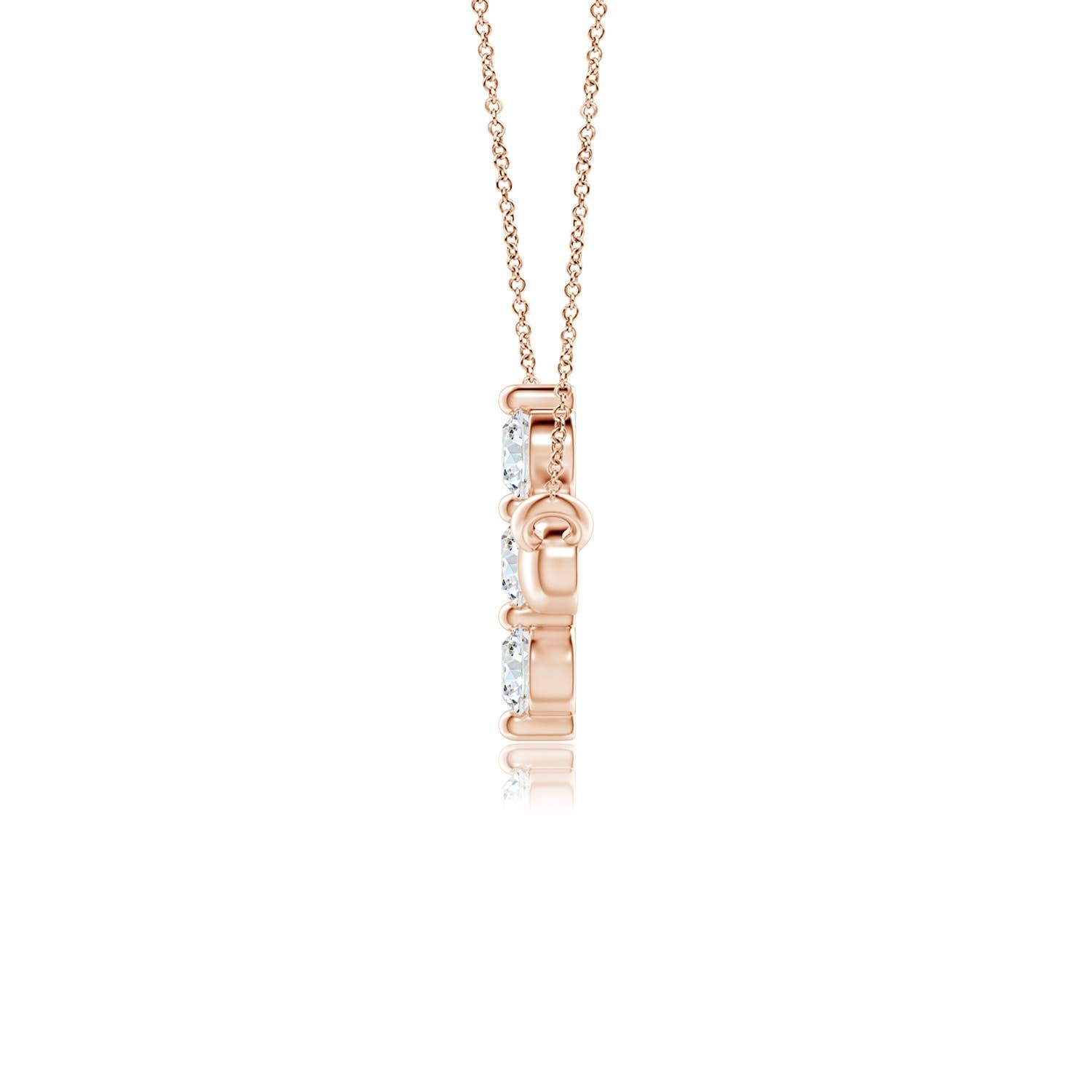 Hanging sideways from a chain is the gorgeous cross pendant crafted in 14k rose gold. The vertical bar of the cross is adorned with three white diamonds in prong setting. The sparkling diamonds lend an impeccable dazzling effect to this lustrous
